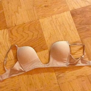 Deep V, nude bra